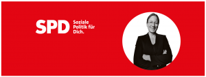 Eine rechteckige Abbildung mit rotem Hintergrund. Auf der rechten Seite und in einem weißen Kreis ist ein freigestelltes Portraitfoto von Dagmar Schmidt in schwarz-weiß zu sehen. Sie ist von der Brust aufwärts fotografiert und lächelt freundlich. Ihre Arme hat sie vor der Brust verschränkt. Ihr langes rotes Haar ist zu einem Zopf gebunden und sie trägt einen schwarzen Hosenanzug, sowie ihre runde Brille. Links daneben steht der weißes Text „SPD Soziale Politik für Dich.“